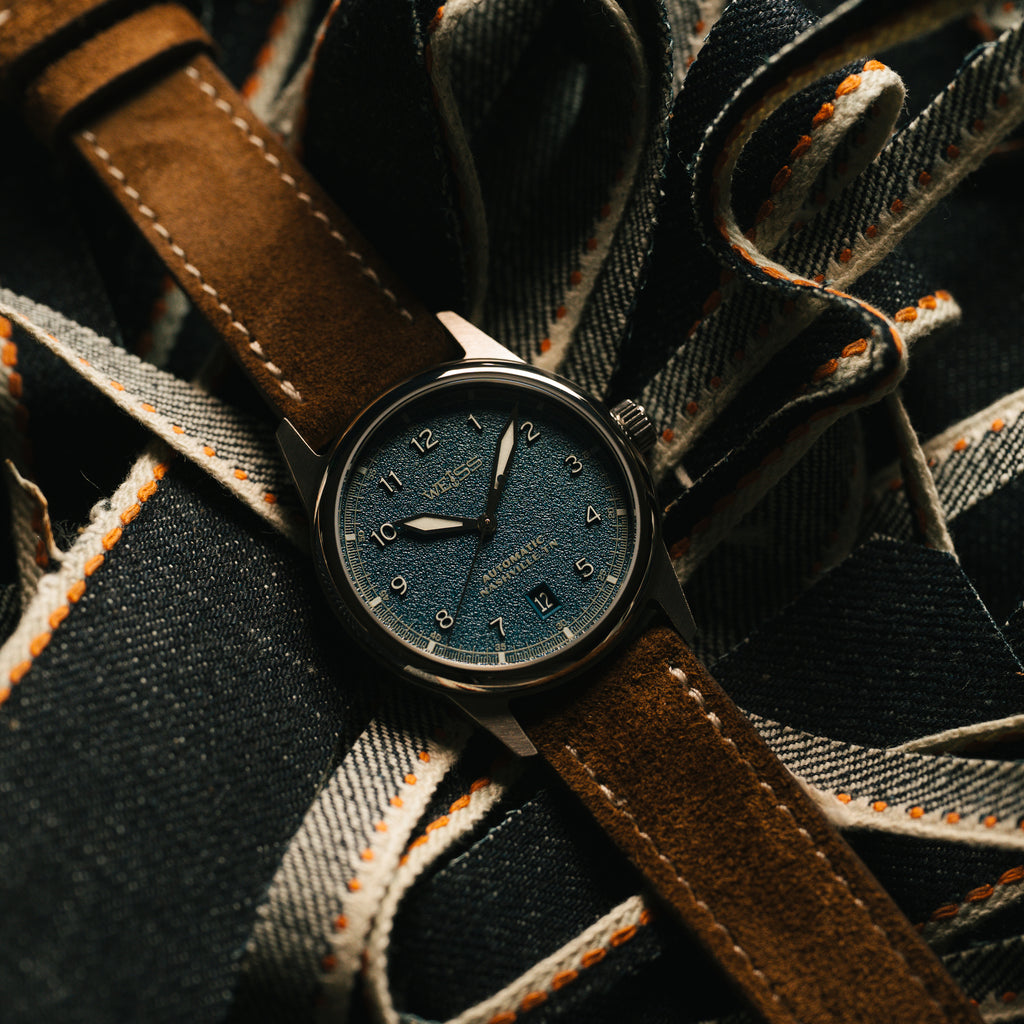 Weiss Blue textured Watch with brown suede strap on denim fabric